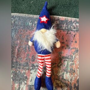 Festive Gnome with Blue Hat and Red Striped Legs